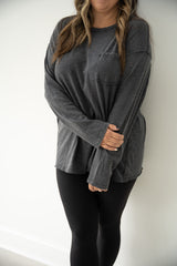 Oversized pocket front tee in Heathered Black.