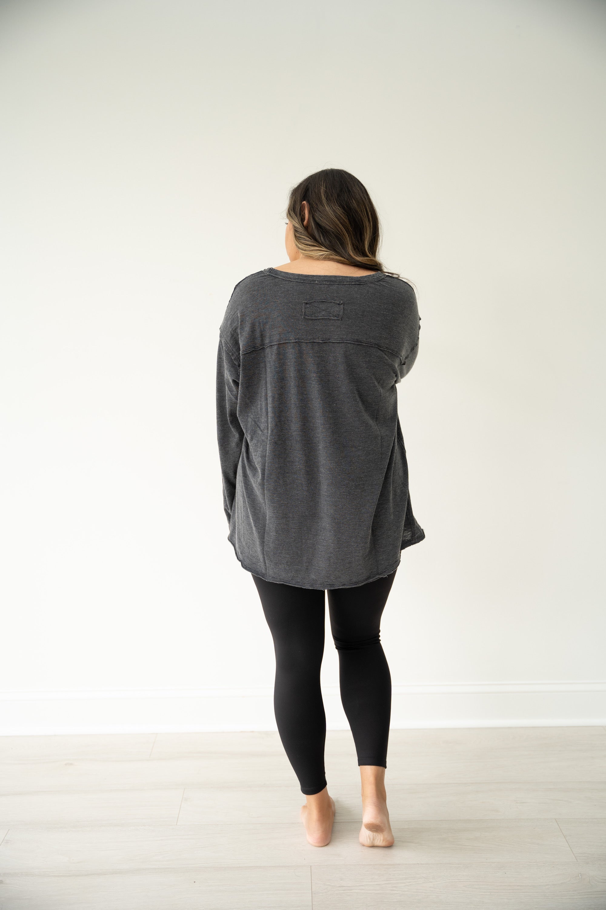 Oversized pocket front tee in Heathered Black.