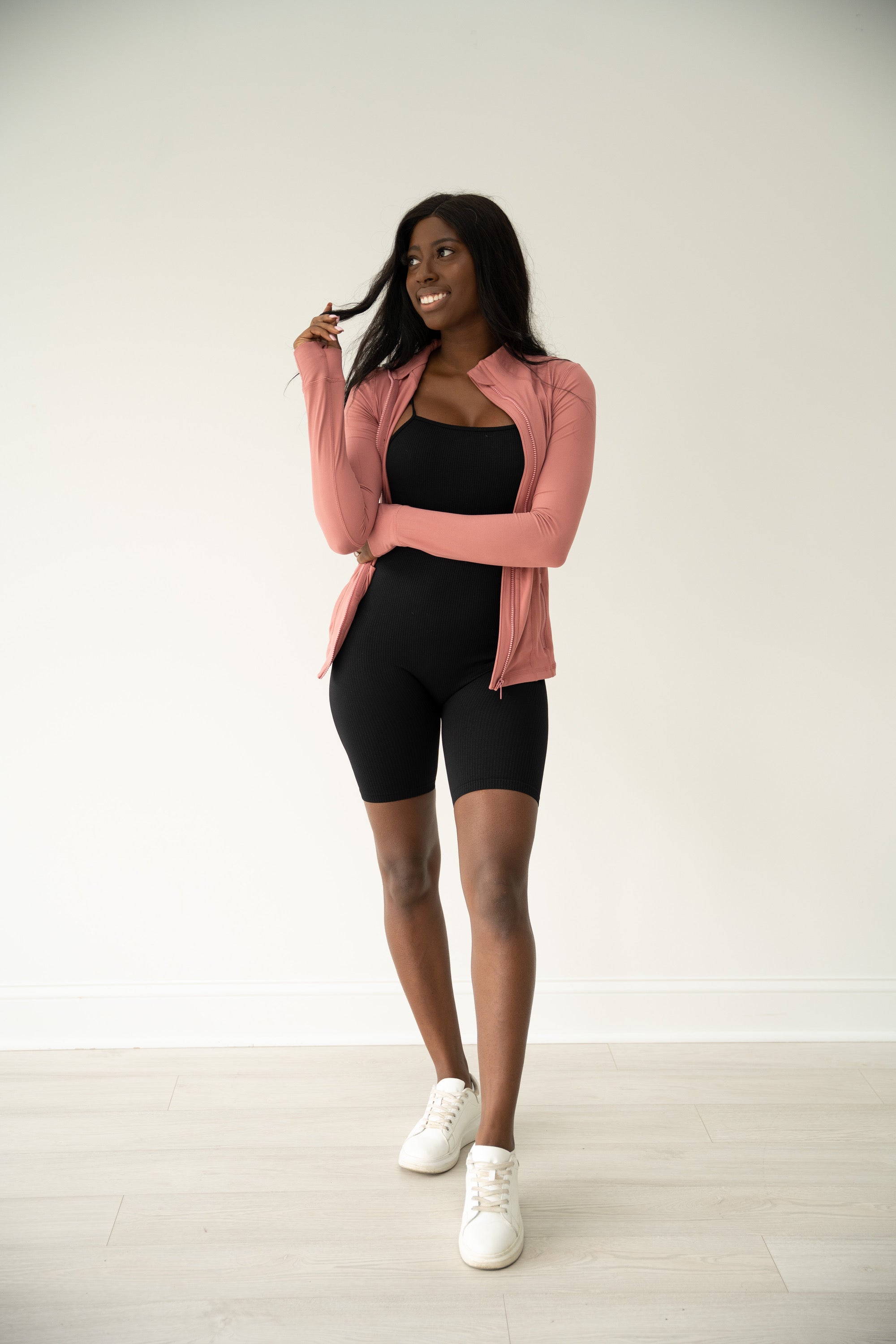 Rose Mock-Neck active jacket with thumbholes and full-length zipper.