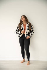 Black & White checkered sherpa jacket with full snap closure.